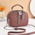 Dusty rose quilted crossbody bag with top handle and bear tassel charm for women - Dusty Pink