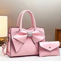 Pink handbag set with large bow detail and faux diamond accents on glossy patent leather - Pink