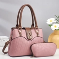 Detail of pink lizard texture tote and clutch set with gold teardrop metal buckle hardware - Pink
