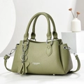 Olive green pebbled leather handbag with star pendant and adjustable shoulder strap - Green