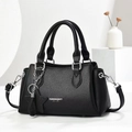 Elegant black lychee grain leather handbag with silver chain and star pendant on stone base - Black