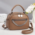 Brown lychee leather crescent handbag with silver metal chain and adjustable strap - Earthy Yellow