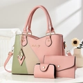 Detalle de un conjunto de 3 bolsos para mujer en colores rosa y verde con herrajes - Rosa Empalme