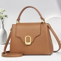 Caramel brown pebbled leather crossbody bag with gold buckle and top handle - Khaki/Earth Yellow