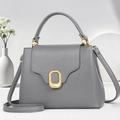 Chic grey litchi leather trapezoid handbag with gold oval buckle and detachable strap - Gray