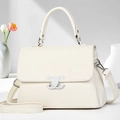 Detail of white lychee leather texture and silver geometric metal buckle on handbag - Off White