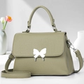 Elegant grass green lychee leather handbag with a silver butterfly clasp for women - Green
