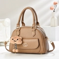 Brown lychee leather crossbody handbag with gold hardware and cloud plush charm - Khaki