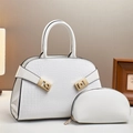 Detail of white crocodile pattern tote bag with matching pouch and gold metal lock hardware - White