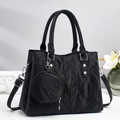 Borsa tote nera plissettata con portamonete rotondo e borchie argentate da donna elegante - Nero