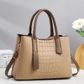 Beige crocodile embossed handbag with brown contrast handles and gold hardware - Khaki