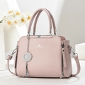Borsa a mano rosa in pelle martellata con doppi manici e tracolla rimovibile - Rosa