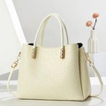 Elegant off-white vintage tote bag with crocodile texture and gold hardware details - Off-white