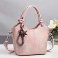Pink glitter tote bag with textured metallic finish and stylish star pendants for women - Pink