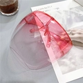 Pink full face protective shield with polycarbonate lens shown in a lifestyle setting - Red