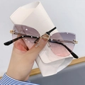 Occhiali da sole cat-eye senza montatura con lenti sfumate viola-rosa e aste in metallo oro - Grigio Rosa