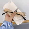 Occhiali da sole cat eye senza montatura con lenti sfumate marroni e dettagli in metallo - Sfumato Marrone