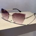 Lunettes de soleil œil-de-chat sans monture avec verres dégradés violets et branches dorées - Dégradé Gris