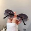 Lunettes de soleil ovales sans monture avec verres dégradés violets et branches dorées - Monture Dorée Verres Gris Dégradés