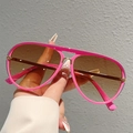 Macro detail of pink aviator frame with double bridge design and gradient lenses - Rose Pink Frame Gradient Tea Lens Gray Line