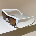 Detail view of bold white frame sunglasses with dark lenses on a metallic display stand - White Frame Brown Lens