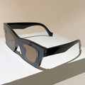 Detail of retro black square frame sunglasses with silver rivets and brown lenses - Black Frame Tea Lens
