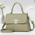 Bolso de mano verde en piel granulada con logo TG plateado y correa de hombro ajustable - Verde
