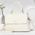 Detalle del bolso de cuero granulado crema con elegante logotipo metálico TG plateado - Blanco Roto
