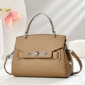Brown lychee leather bucket bag with top handle and detachable strap in a 45-degree view - Dark Khaki