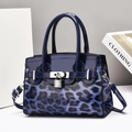Blue leopard print tote bag with silver padlock and glossy leather handles - Blue