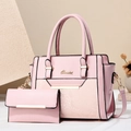 Pink tote handbag and envelope wallet set with gold hardware and snake pattern details - Handbag And Wallet Set / Pink