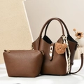 Brown lychee leather tote bag set with golden hardware and plush bear pendant detail - Coffee