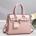 Pink luxury tote bag with woven panel and gold lock, stylish commuter handbag with charm - Pink