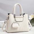 Detail of off-white handbag with marble texture, logo branding and mini charm attachment - Off-white