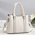 Chic beige tote bag with marble texture pattern and silver hardware for office commute - Off White