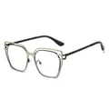 Fashionable silver cat-eye blue light blocking glasses with sleek black metal temples - Silver Frame
