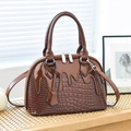 Dark brown patent leather handbag with crocodile pattern and unique fluid drip stitching - Dark Brown