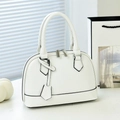 Minimalist white shell-shaped shoulder bag with faux crocodile texture and black edge trim - Off-white