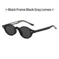 Occhiali da sole rotondi TR90 neri classici con lenti grigie e dettagli in metallo - Montatura Nera Lenti Grigio Nero