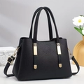 Classic black lychee texture handbag with gold metal accents and twin top handles - Black