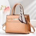 Elegant beige crocodile pattern handbag with printed silk scarf and gold hardware - Khaki