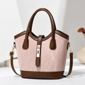Pink and brown contrast textured bucket bag with gold hardware and shoulder strap - Pink