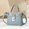 Elegant grey-blue structured handbag with pebble leather texture and silver metal clasp - Blue