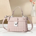 Elegant light pink box handbag with square embossing and silver metal twist lock - Pink