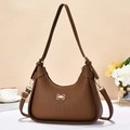 Brown textured shoulder bag with golden bow hardware and dual straps for women - Earthy Yellow