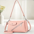 Pink lychee texture crossbody bag with adjustable strap and stylish front pocket - Pink