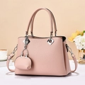 Pink lychee grain leather handbag with matching coin purse and silver metal hardware details - Pink