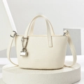 Minimalist beige pebble leather tote bag with silver chain lock and adjustable strap - Off-white