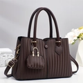 Detail of dark brown tote with vertical stripe texture and small matching pouch - Coffee