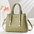 Olive green woven tote bag with adjustable shoulder strap and silver hardware accents - Green